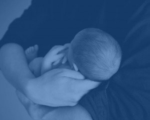 baby being held | stock image